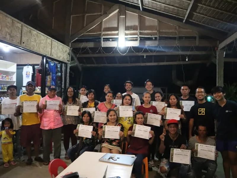 Bumicerts certificate ceremony with community members in the Philippines